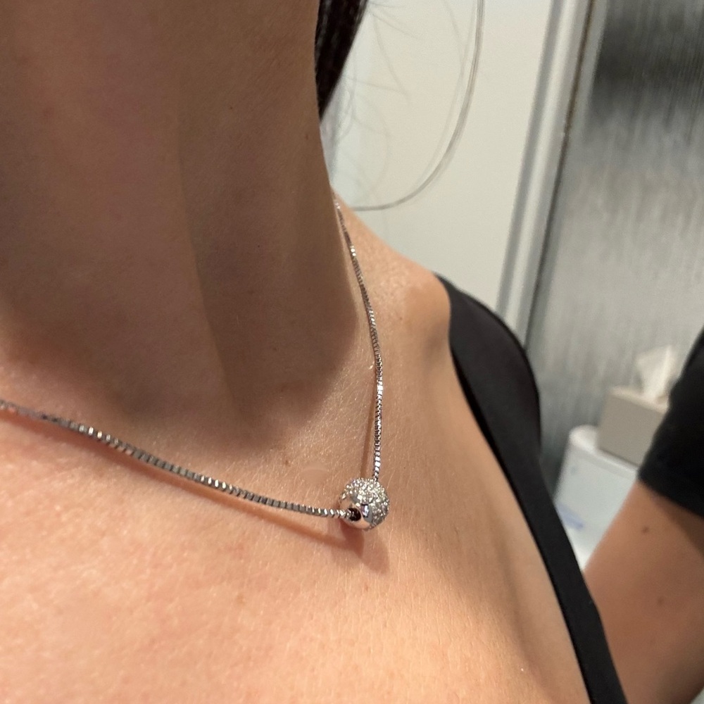 18K White gold 16” necklace with ball pendant covered with pave diamonds